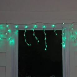 70 Green LED Wide Angle Icicle Christmas Lights - 5.25 Ft White Wire -Optimal Christmas Shop britestar 39 724 77 3 20508.1667578255