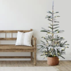 6.5' Pre-Lit Flocked Slim Nordmann Fir Artificial Christmas Tree - Warm Clear LED Lights