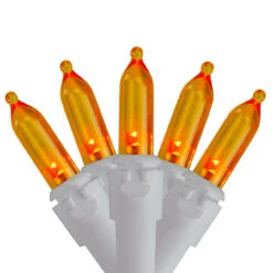 Set Of 50 Orange LED Mini Christmas Lights 4" Spacing - White Wire