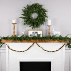 5' Green, Gold And Red Jingle Bell Christmas Garland, Unlit 12 5' Green, Gold And Red Jingle Bell Christmas Garland, Unlit -Optimal Christmas Shop northlight ys28302 styled20on20fireplace202 69750.1686600976