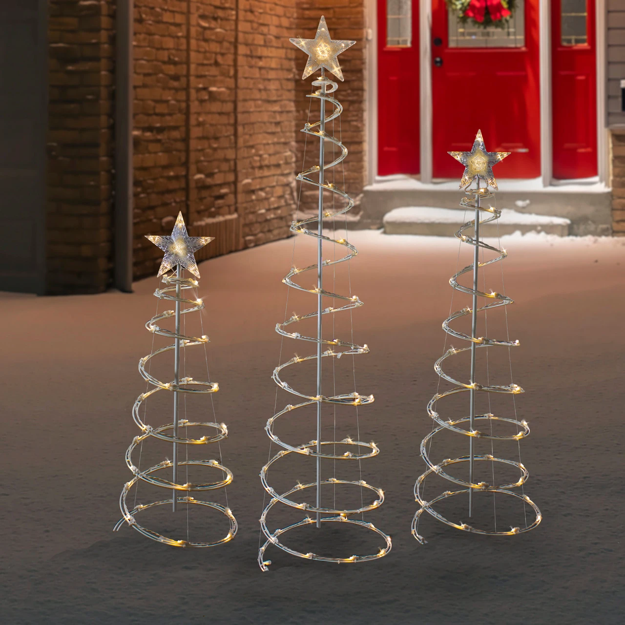 Set Of 3 LED Lighted Warm White Outdoor Spiral Christmas Cone Trees 3', 4', And 6' 4 Set Of 3 LED Lighted Warm White Outdoor Spiral Christmas Cone Trees 3', 4', And 6' - Image 2